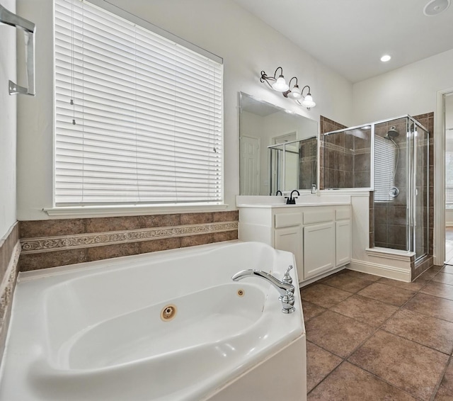 3816 Appleton Ln, Flower Mound, TX 75022 - bathroom with a whirlpool tub, vanity, a shower stall, and tile patterned floors