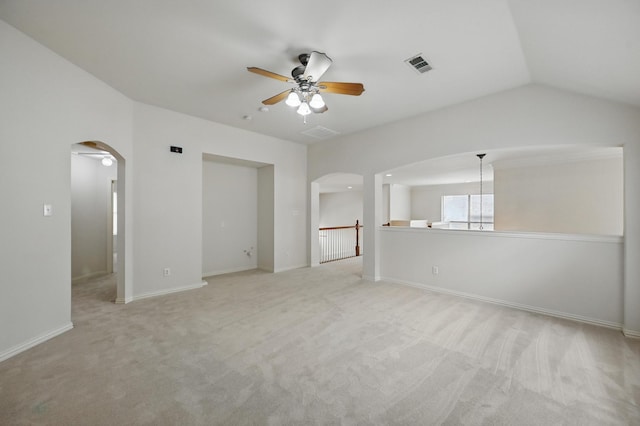 3816 Appleton Ln, Flower Mound, TX 75022 - empty room with arched walkways, ceiling fan, light carpet, and vaulted ceiling