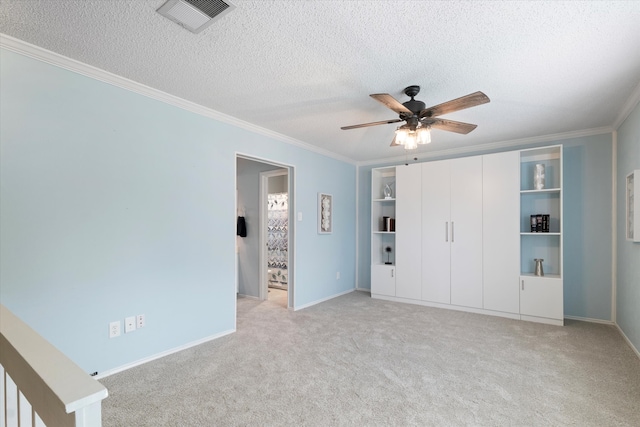 132 Cherrybark Dr, Coppell, TX 75019 - unfurnished bedroom with ornamental molding, light colored carpet, a textured ceiling, baseboards, and a ceiling fan