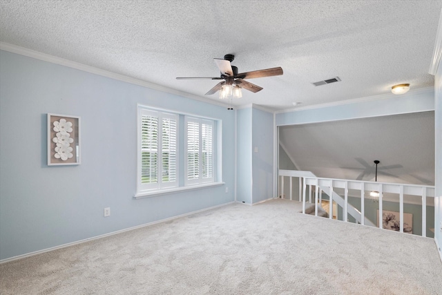 132 Cherrybark Dr, Coppell, TX 75019 - unfurnished room with a ceiling fan, ornamental molding, carpet floors, baseboards, and a textured ceiling
