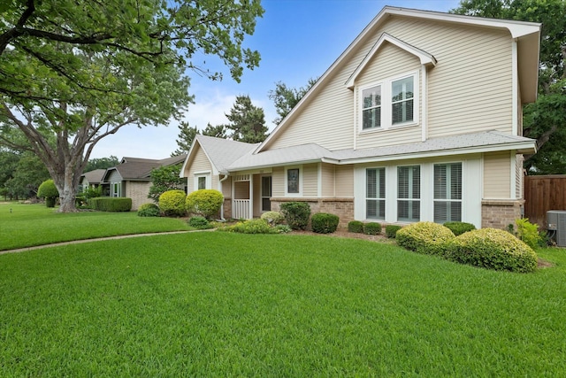 132 Cherrybark Dr, Coppell, TX 75019 - traditional-style house with brick siding and central AC