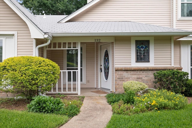 132 Cherrybark Dr, Coppell, TX 75019 - entrance to property with a porch and brick siding
