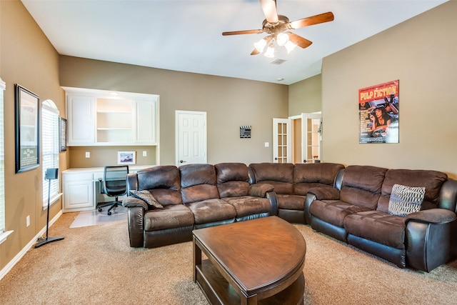 8017 Stonehill Dr, Plano, TX 75025 - living room with light colored carpet, ceiling fan, an office area, and baseboards