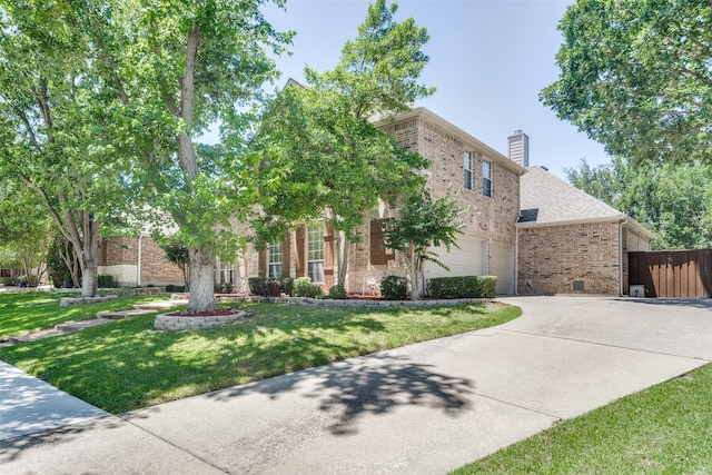 8017 Stonehill Dr, Plano, TX 75025 - view of front facade featuring brick siding, concrete driveway, a front lawn, a garage, and a chimney