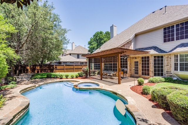 8017 Stonehill Dr, Plano, TX 75025 - view of swimming pool featuring a patio area and a pool with connected hot tub