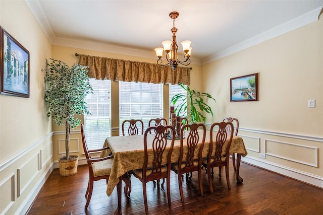 8017 Stonehill Dr, Plano, TX 75025 - dining space featuring a chandelier, ornamental molding, dark wood-type flooring, a decorative wall, and wainscoting