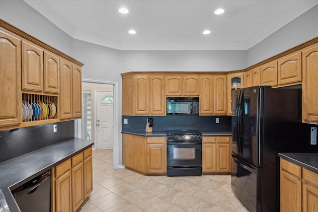 12319 N Emerald Ranch Ln, Forney, TX 75126 - kitchen with black appliances, dark countertops, ornamental molding, recessed lighting, and light tile patterned floors