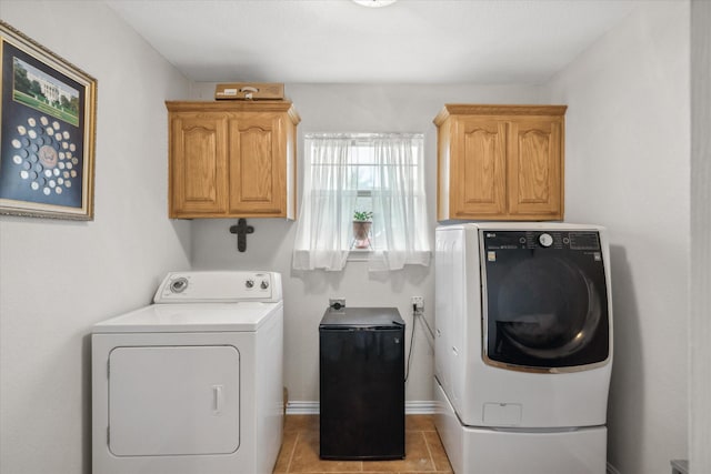 12319 N Emerald Ranch Ln, Forney, TX 75126 - washroom with washer and clothes dryer, cabinet space, and light tile patterned floors