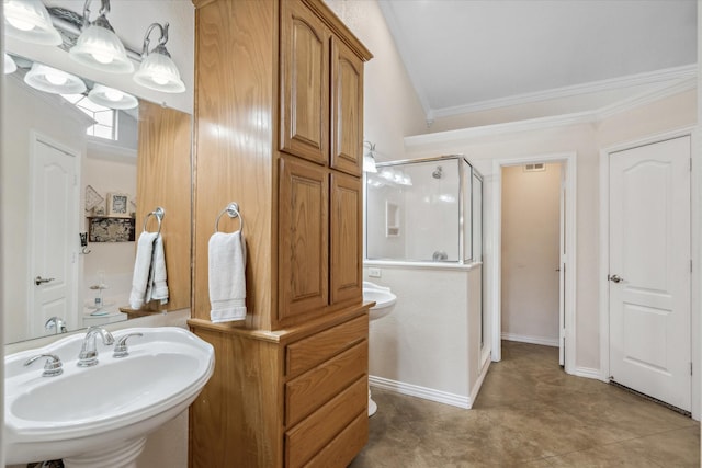 12319 N Emerald Ranch Ln, Forney, TX 75126 - bathroom featuring a sink, a stall shower, and crown molding