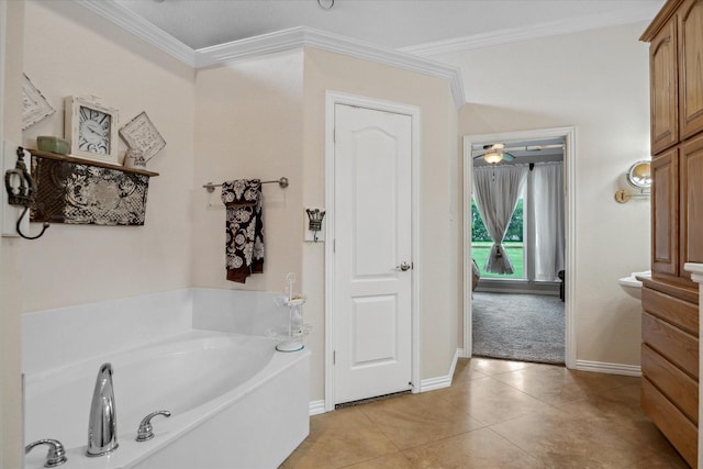 12319 N Emerald Ranch Ln, Forney, TX 75126 - bathroom with a garden tub, ornamental molding, vanity, tile patterned flooring, and baseboards