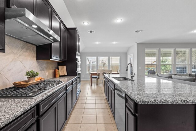 952 Sweeping Butte Dr, Fort Worth, TX 76052 - kitchen featuring exhaust hood, appliances with stainless steel finishes, a sink, recessed lighting, and tasteful backsplash