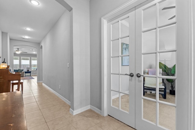 952 Sweeping Butte Dr, Fort Worth, TX 76052 - corridor featuring arched walkways, light tile patterned floors, french doors, baseboards, and recessed lighting