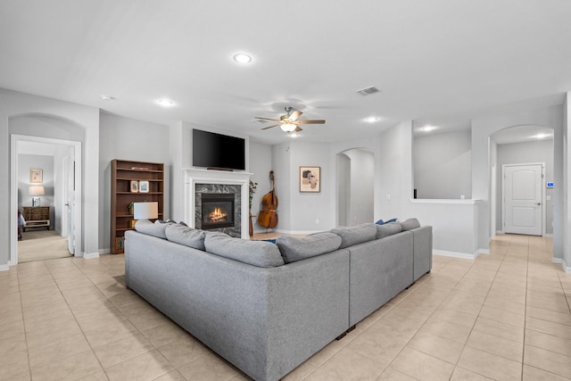 952 Sweeping Butte Dr, Fort Worth, TX 76052 - living area featuring arched walkways, a ceiling fan, light tile patterned floors, and recessed lighting