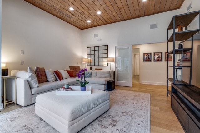 9616 Viewside Dr, Dallas, TX 75231 - living room with wooden ceiling, recessed lighting, light wood-style flooring, and baseboards