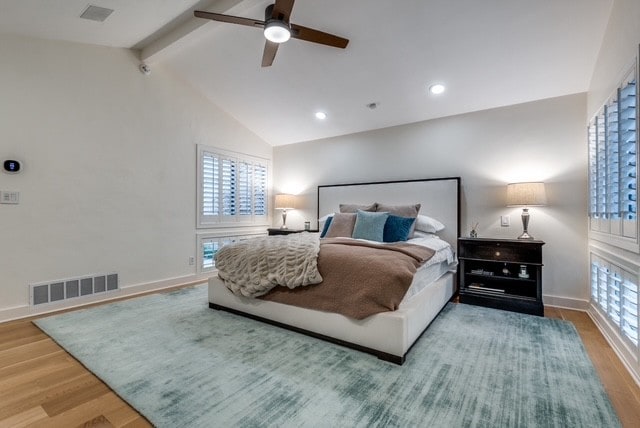 9616 Viewside Dr, Dallas, TX 75231 - bedroom with wood finished floors, multiple windows, baseboards, and recessed lighting