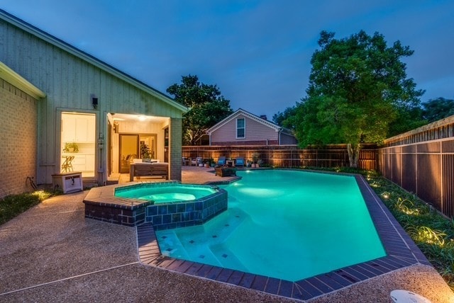 9616 Viewside Dr, Dallas, TX 75231 - view of swimming pool with a fenced backyard, a pool with connected hot tub, and a patio area
