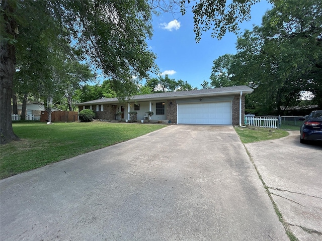 107 W Bayside Dr, Mabank, TX 75156 - ranch-style house featuring concrete driveway, an attached garage, and brick siding