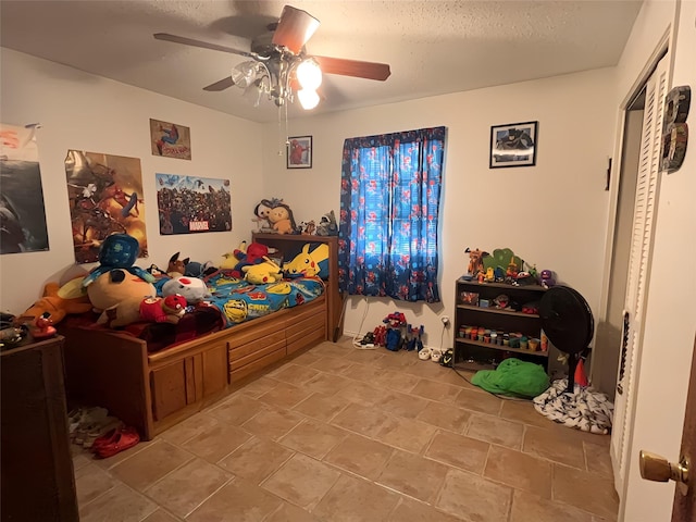 107 W Bayside Dr, Mabank, TX 75156 - bedroom with a ceiling fan and a textured ceiling