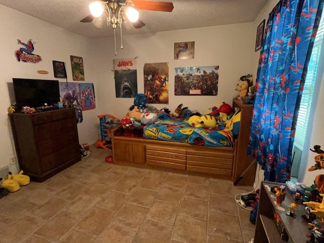 107 W Bayside Dr, Mabank, TX 75156 - bedroom featuring a textured ceiling, tile patterned flooring, and ceiling fan