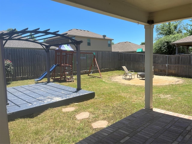 1016 Camp Verde Dr, Forney, TX 75126 - view of yard featuring a fire pit, a playground, and a patio area