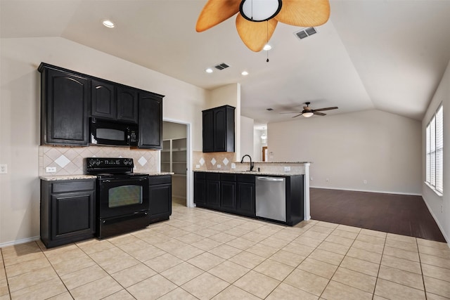 1016 Camp Verde Dr, Forney, TX 75126 - kitchen featuring black appliances, ceiling fan, lofted ceiling, a sink, and dark cabinets