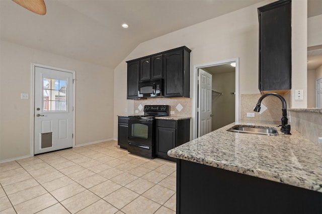 1016 Camp Verde Dr, Forney, TX 75126 - kitchen featuring black appliances, a sink, decorative backsplash, dark cabinetry, and vaulted ceiling