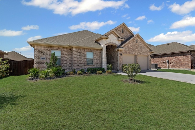 3640 Twin Pines Dr, Grand Prairie, TX 76065 - french provincial home with concrete driveway, brick siding, a garage, and a shingled roof
