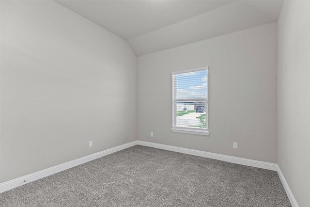 3640 Twin Pines Dr, Grand Prairie, TX 76065 - unfurnished room featuring carpet floors, baseboards, and vaulted ceiling