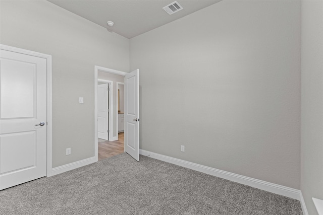 3640 Twin Pines Dr, Grand Prairie, TX 76065 - unfurnished bedroom with light colored carpet and baseboards