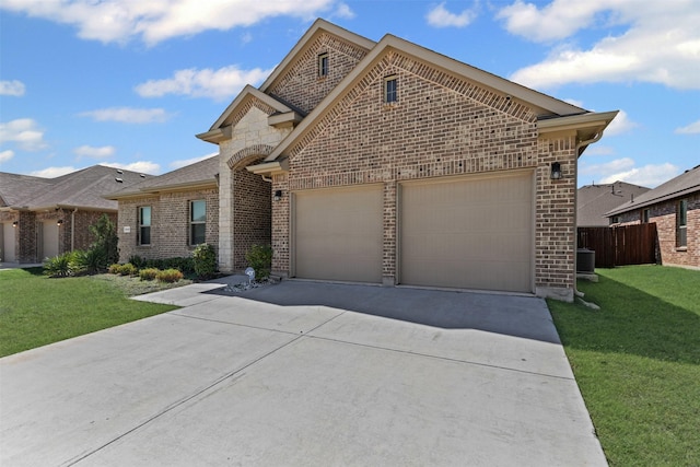 3640 Twin Pines Dr, Grand Prairie, TX 76065 - french country home with brick siding, driveway, and an attached garage