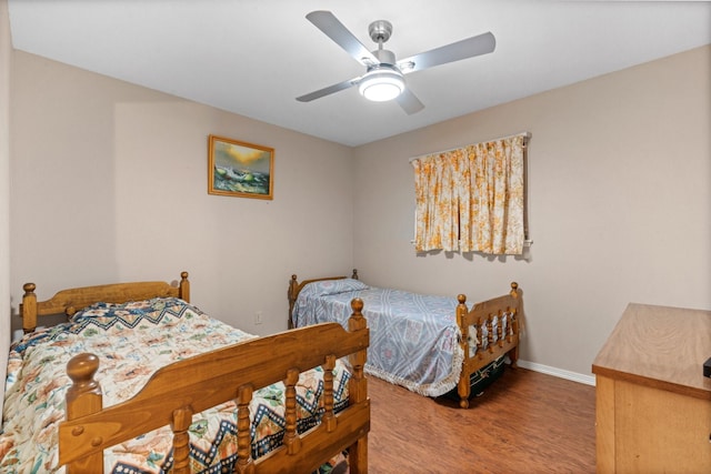 4028 Engleman St, Fort Worth, TX 76137 - bedroom featuring wood finished floors, baseboards, and a ceiling fan