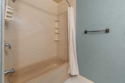 4028 Engleman St, Fort Worth, TX 76137 - full bathroom featuring shower / bath combo with shower curtain