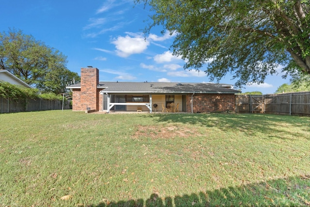 4028 Engleman St, Fort Worth, TX 76137 - rear view of property with a chimney and brick siding