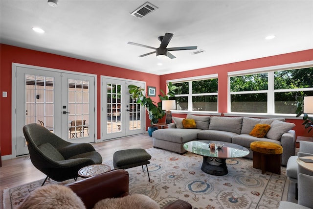 9918 Ila Dr, Dallas, TX 75220 - living area with french doors, light wood-style flooring, ceiling fan, and recessed lighting