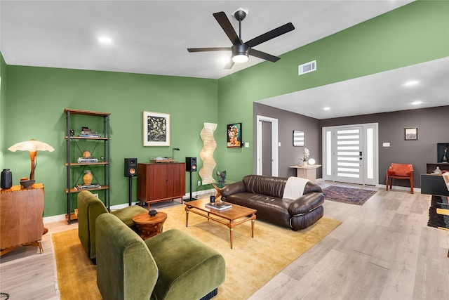 9918 Ila Dr, Dallas, TX 75220 - living room with ceiling fan, wood finished floors, baseboards, lofted ceiling, and recessed lighting