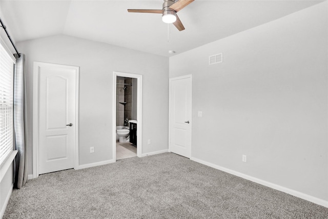 1135 Saddle Ridge Dr, Aubrey, TX 76227 - unfurnished bedroom with carpet flooring, lofted ceiling, connected bathroom, baseboards, and ceiling fan