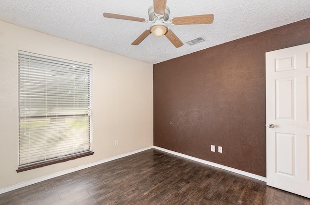 1824 Angelina Dr, Garland, TX 75040 - unfurnished room featuring wood finished floors, ceiling fan, a textured ceiling, and baseboards