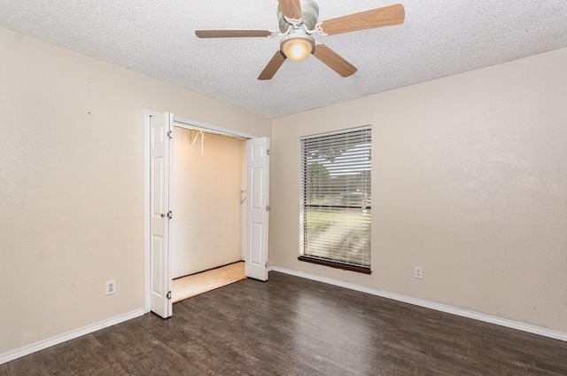 1824 Angelina Dr, Garland, TX 75040 - empty room featuring a textured ceiling, wood finished floors, baseboards, and ceiling fan