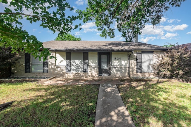 1824 Angelina Dr, Garland, TX 75040 - ranch-style house with a front yard, brick siding, and a shingled roof
