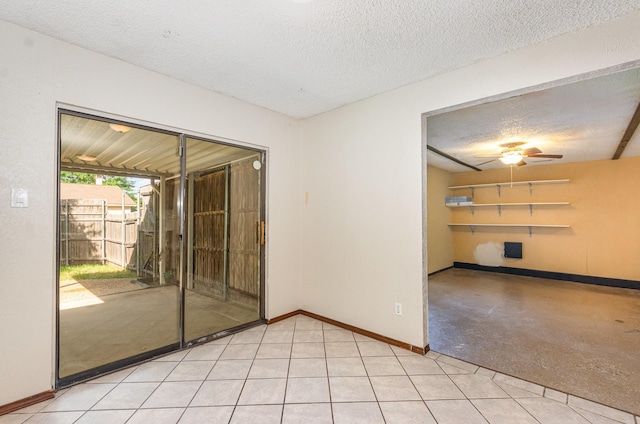 1824 Angelina Dr, Garland, TX 75040 - unfurnished room with a textured ceiling, baseboards, and ceiling fan