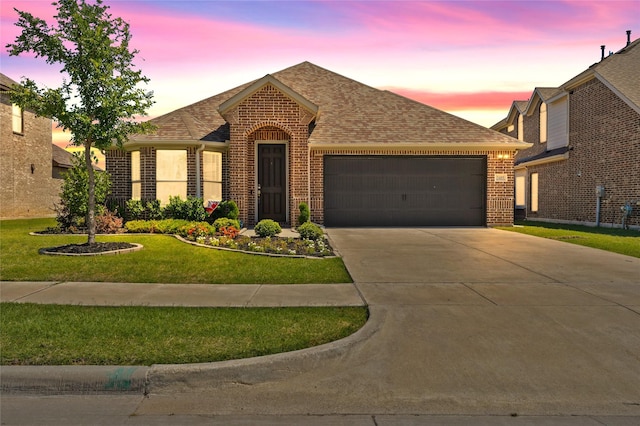 3409 Melrose Ct, Wylie, TX 75098 - view of front facade with brick siding, a garage, a shingled roof, driveway, and a lawn