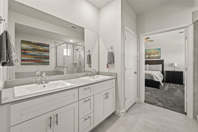 3409 Melrose Ct, Wylie, TX 75098 - full bath featuring double vanity, a stall shower, ensuite bath, baseboards, and tile patterned flooring