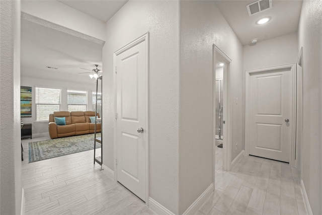 3409 Melrose Ct, Wylie, TX 75098 - hall with baseboards and wood tiled floors