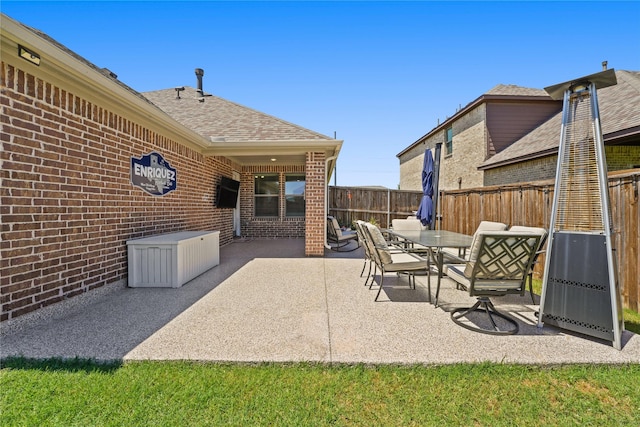 3409 Melrose Ct, Wylie, TX 75098 - fenced backyard with a patio area and outdoor dining space