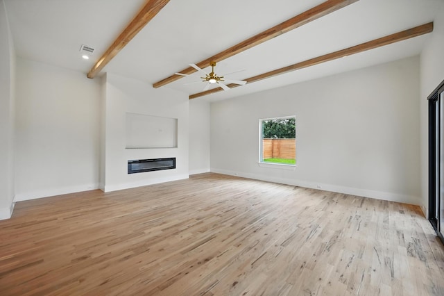 1224 S Pine St, Grapevine, TX 76051 - unfurnished living room with a glass covered fireplace, light wood finished floors, a ceiling fan, and baseboards
