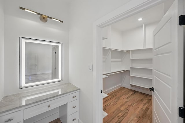 1224 S Pine St, Grapevine, TX 76051 - spacious closet featuring light wood finished floors