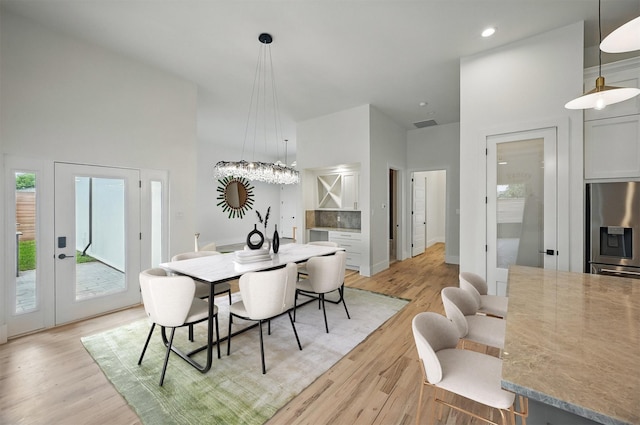 1224 S Pine St, Grapevine, TX 76051 - dining room featuring high vaulted ceiling, light wood finished floors, and recessed lighting
