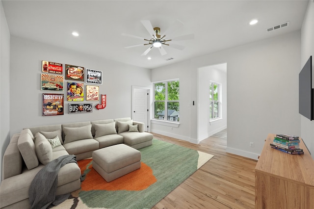 1224 S Pine St, Grapevine, TX 76051 - living area featuring light wood finished floors, recessed lighting, ceiling fan, and baseboards