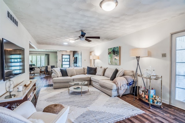 10542 Vinemont St, Dallas, TX 75218 - living area featuring wood finished floors and a ceiling fan