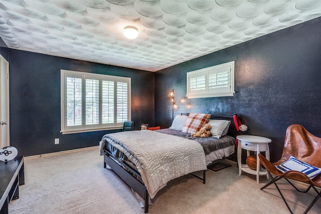 10542 Vinemont St, Dallas, TX 75218 - carpeted bedroom with multiple windows